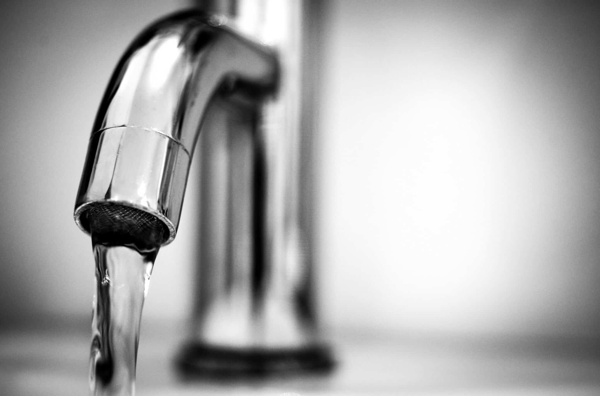 Up close photo of a faucet