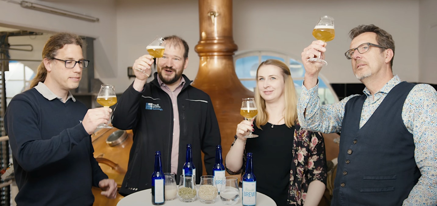 Employees of water technology company Xylem sample Reuse Brew, a Bavarian-style beer brewed using wastewater